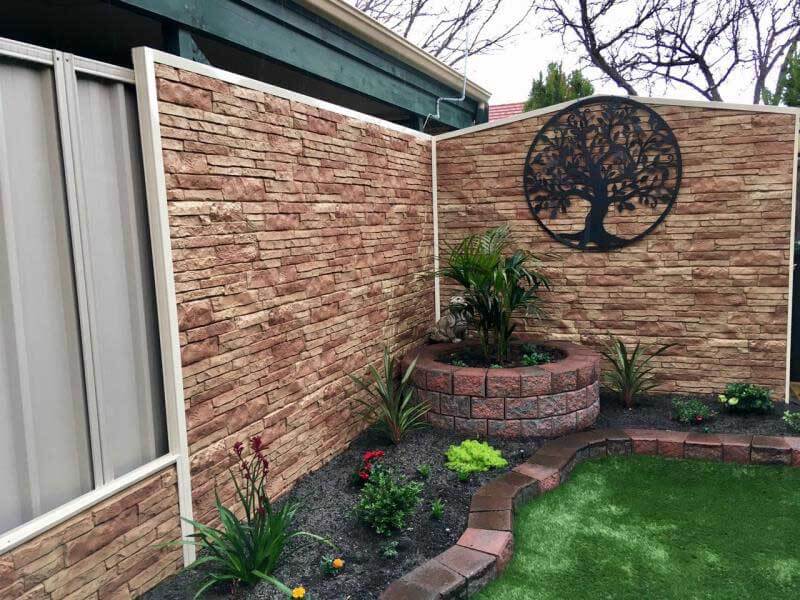 Apply red faux-stone coating on the brick wall, creating red-brick wall in a small garden is easy and fast