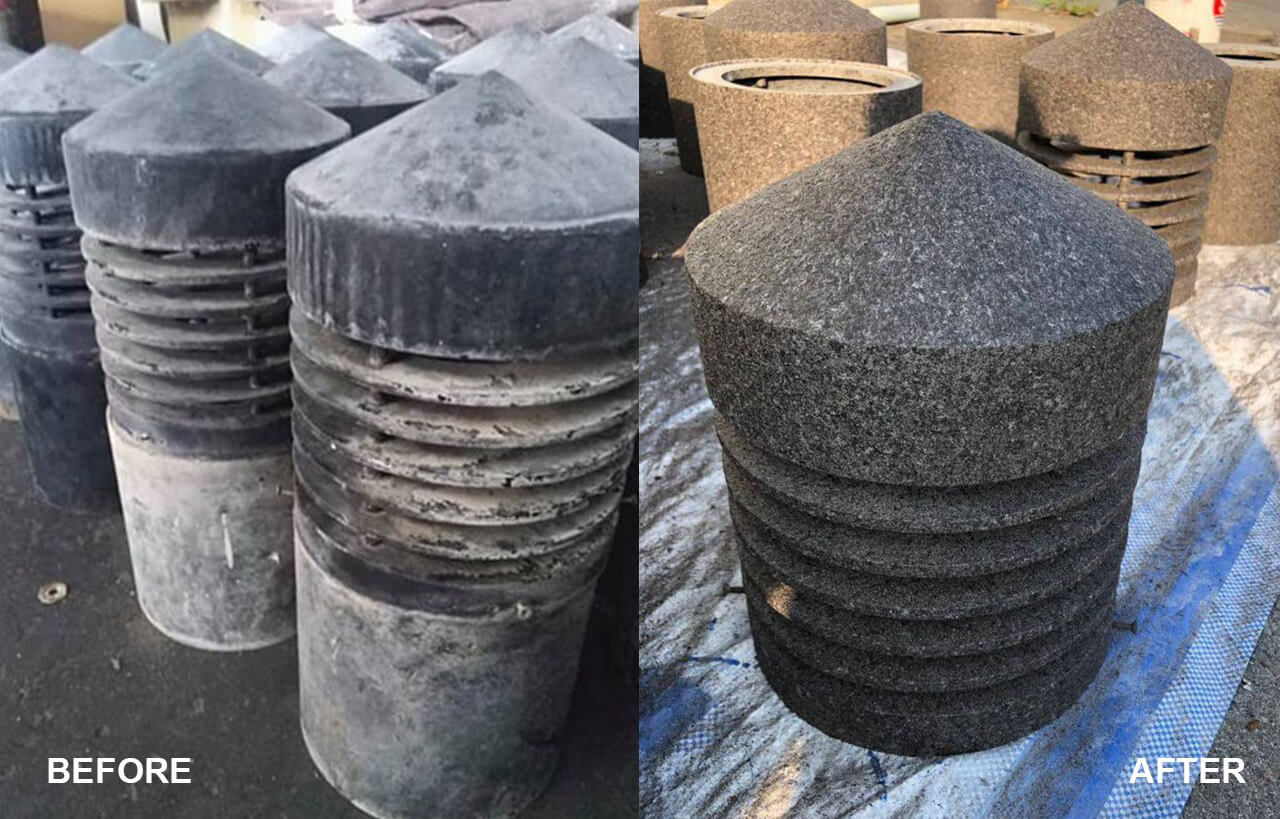 グレーの水シミと泥で汚れた古い黒ランプにADD STONE ストーンテクスチャコーティングを吹き付け、花崗岩のような新しい外観を持たせる